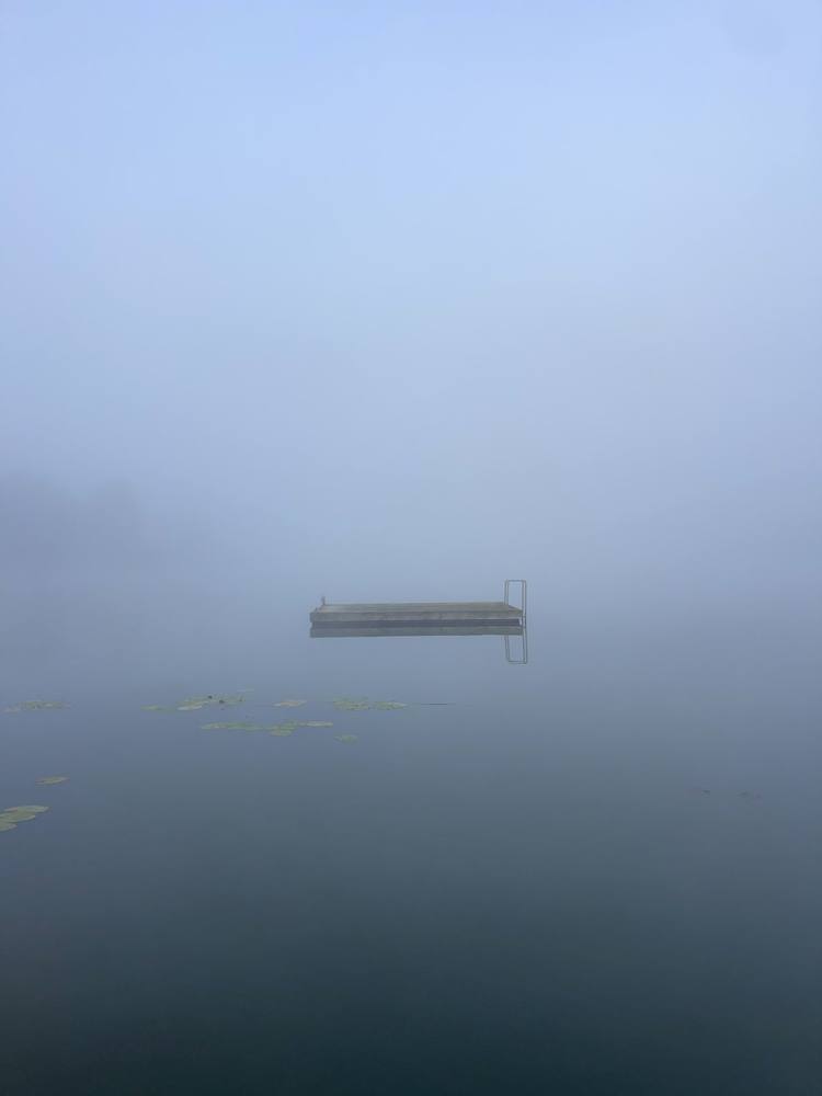 Fog over the lake with a floating wooden platform, DOYOU PLACE, Lithuania